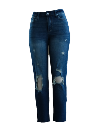 Blue jeans with distressing on a white background